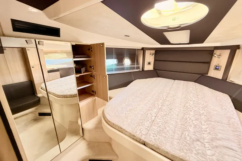  Yacht Photos Pics Luxurious 2016 Cranchi M44 HT yacht interior with spacious bed and modern design.