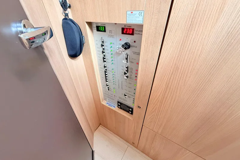  Yacht Photos Pics Electrical control panel on 2016 Cranchi M44 HT yacht interior.