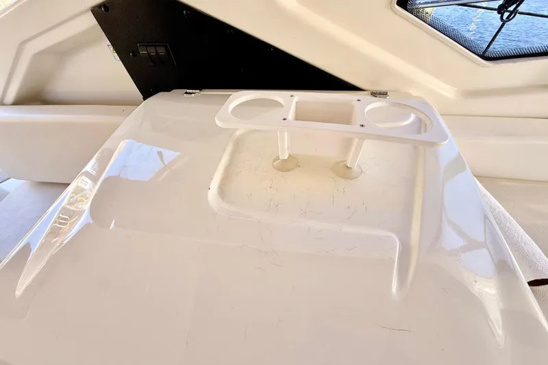  Yacht Photos Pics Interior detail of 2016 Cranchi M44 HT yacht with cup holders and window view.