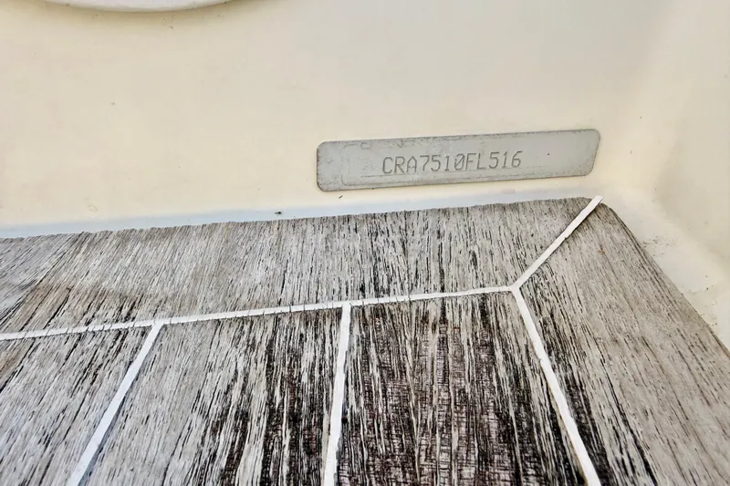  Yacht Photos Pics 2016 Cranchi M44 HT boat hull identification number on wooden deck.