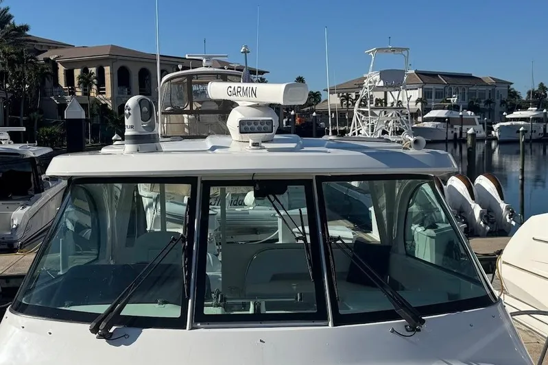  Yacht Photos Pics 2021 Pursuit OS 385 Offshore boat docked at marina with Garmin equipment.