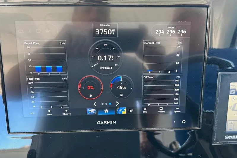  Yacht Photos Pics Garmin display on 2021 Pursuit OS 385 Offshore showing engine metrics and GPS speed.