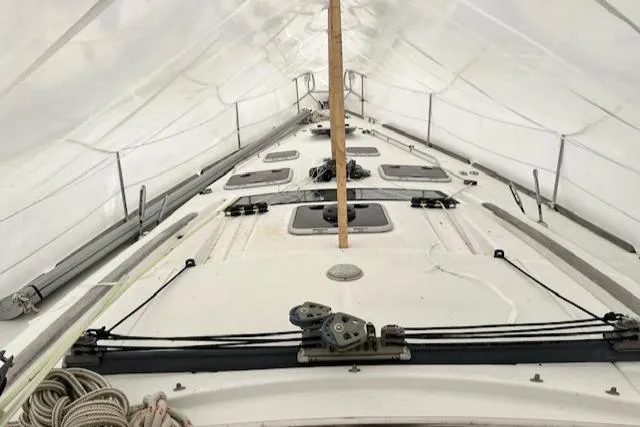 Lotus II Yacht Photos Pics 2007 Beneteau Oceanis 46 sailboat deck under protective cover.