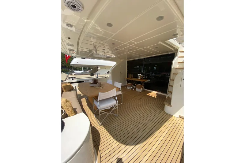 Slt Yacht Photos Pics Luxurious 2008 Ferretti Yachts 881 deck with elegant seating and wooden flooring.