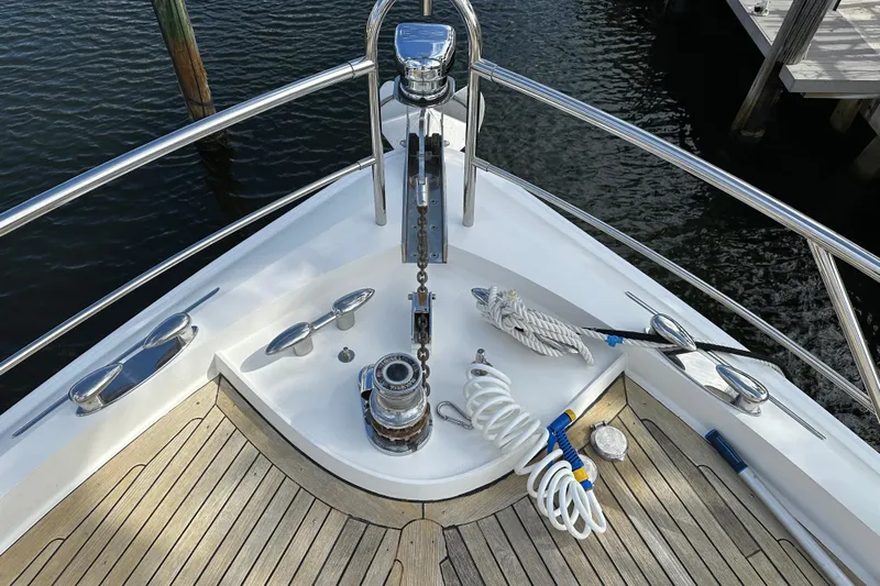  Yacht Photos Pics Bow of 2009 Lazzara LSX 75 yacht with anchor and ropes.