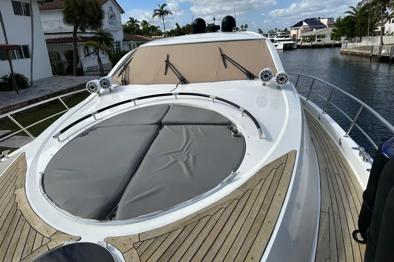  Yacht Photos Pics 2009 Lazzara LSX 75 yacht with sleek deck and luxurious design in a marina setting.