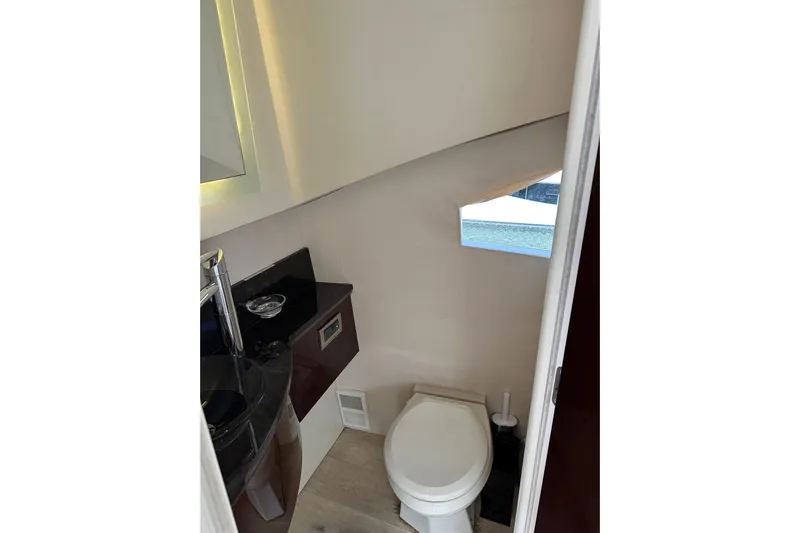  Yacht Photos Pics Luxurious bathroom in 2009 Lazzara LSX 75 yacht, featuring modern fixtures and sleek design.