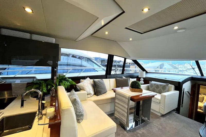  Yacht Photos Pics Luxurious interior of 2014 Prestige 500 yacht with elegant seating and modern decor.