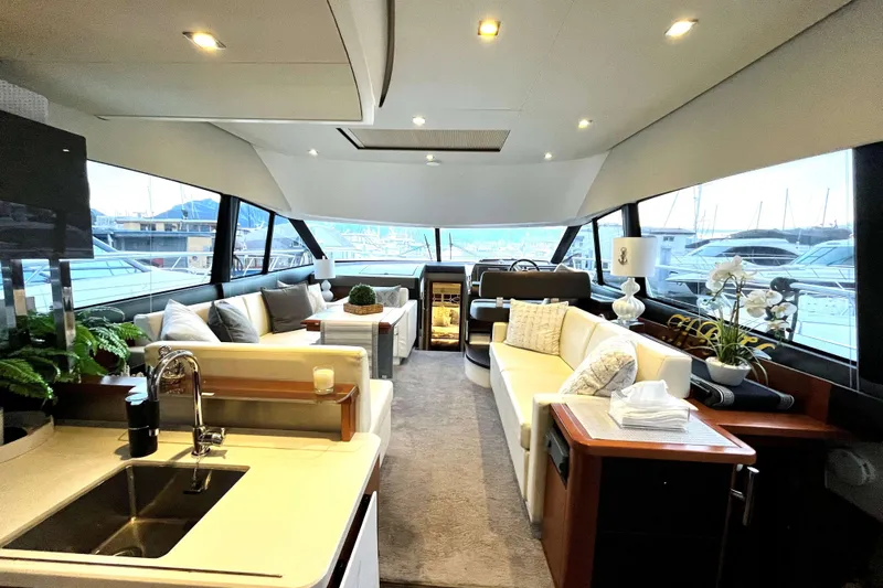  Yacht Photos Pics Luxurious interior of a 2014 Prestige 500 yacht with elegant seating and modern amenities.