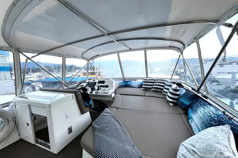  Yacht Photos Pics Luxurious 2014 Prestige 500 yacht interior with helm, seating, and panoramic windows.