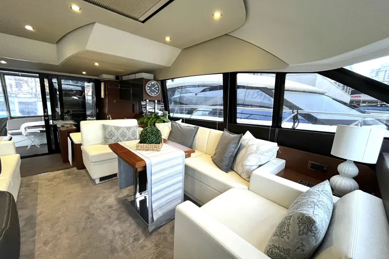  Yacht Photos Pics Luxurious interior of a 2014 Prestige 500 yacht with elegant seating and decor.