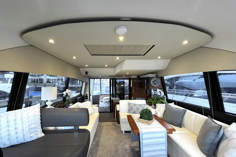  Yacht Photos Pics Luxurious interior of a 2014 Prestige 500 yacht with elegant seating and decor.