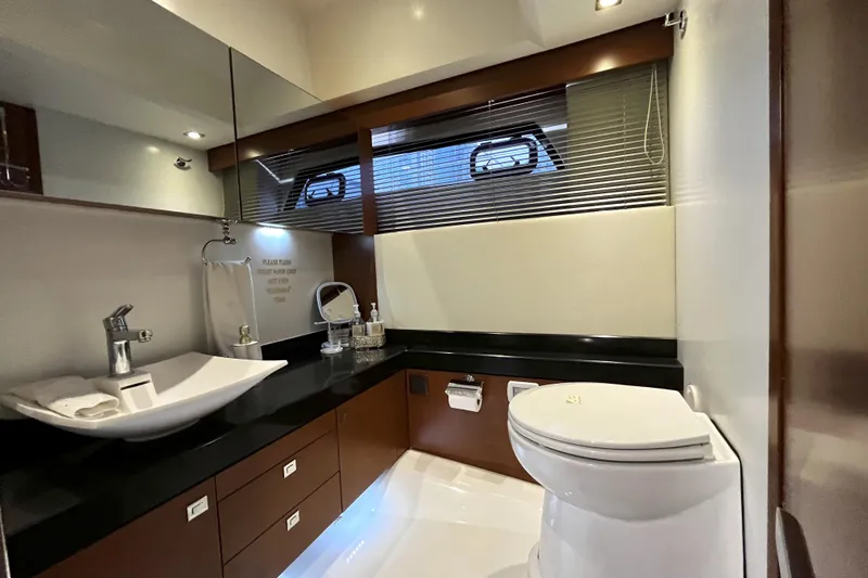  Yacht Photos Pics Luxurious bathroom in 2014 Prestige 500 yacht with modern fixtures and elegant design.
