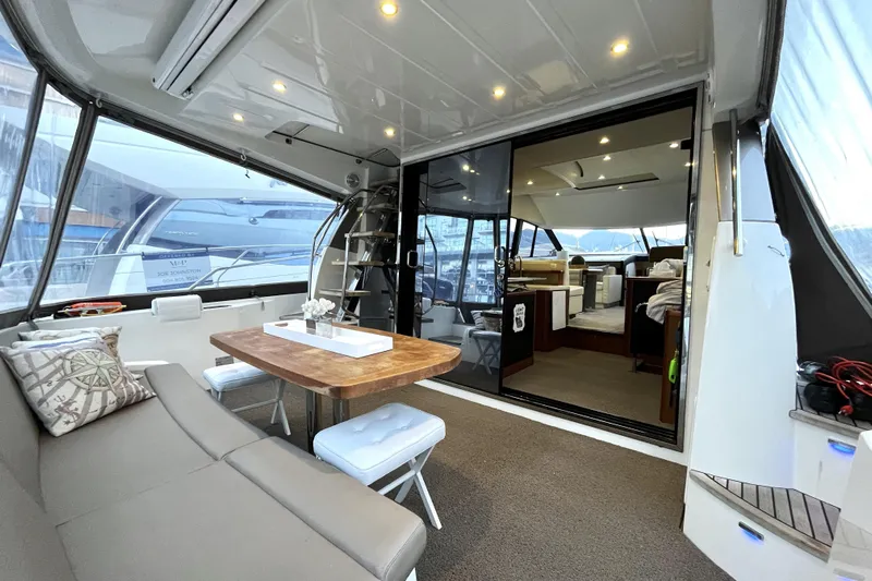  Yacht Photos Pics Luxurious 2014 Prestige 500 yacht interior with elegant seating and dining area.