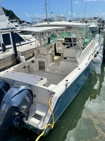  Yacht Photos Pics 2022 Grady-White Express 330 boat docked with twin Yamaha engines.
