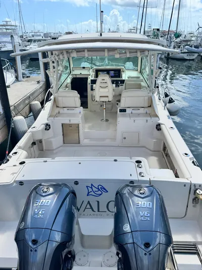  Yacht Photos Pics 2022 Grady-White Express 330 boat docked with twin 300 V6 engines.