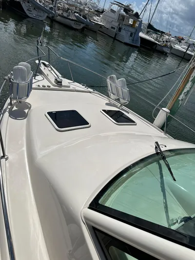  Yacht Photos Pics 2022 Grady-White Express 330 boat docked in marina, sunny day.