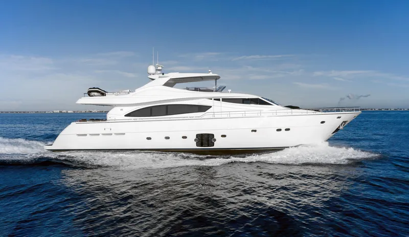 Nm03008 Yacht Photos Pics 2008 Ferretti Yachts 881 cruising on open water under clear blue sky.