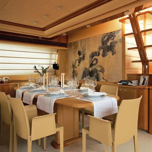 Nm03008 Yacht Photos Pics Luxurious dining area on 2008 Ferretti Yachts 881, featuring elegant table setting and modern decor.