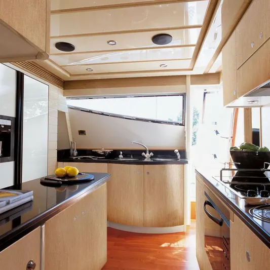 Nm03008 Yacht Photos Pics Luxurious kitchen interior of 2008 Ferretti Yachts 881, featuring modern design and sleek finishes.