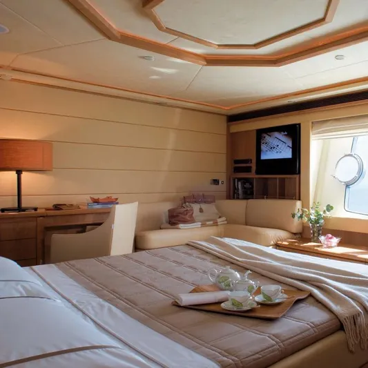 Nm03008 Yacht Photos Pics Luxurious interior of 2008 Ferretti Yachts 881 with elegant bedroom and cozy seating area.