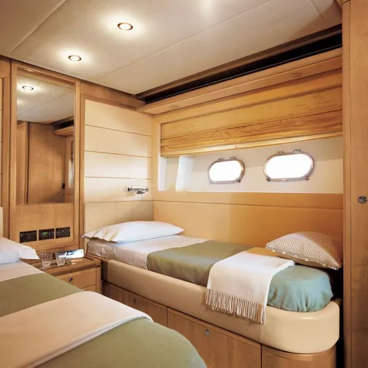 Nm03008 Yacht Photos Pics Luxurious cabin interior of 2008 Ferretti Yachts 881 with twin beds and elegant wood finish.