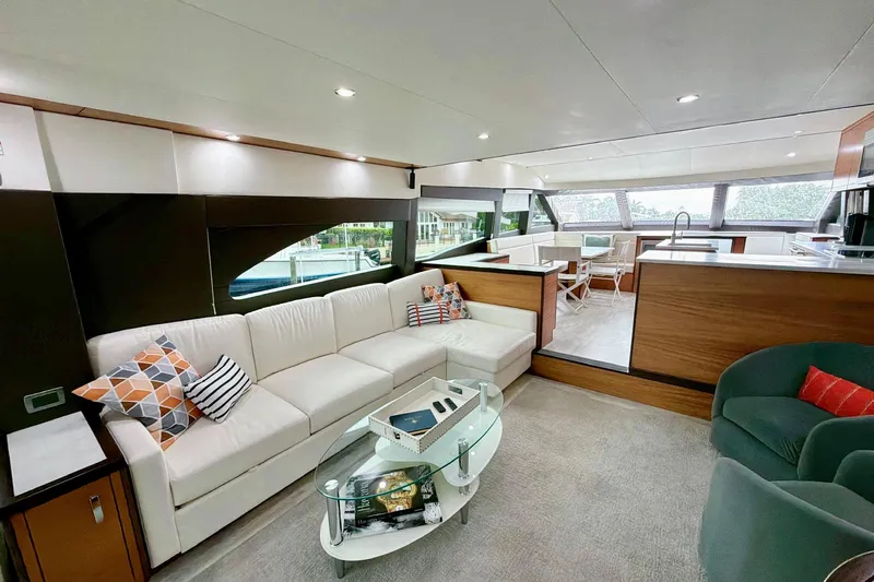 2024 Refit Yacht Photos Pics Luxurious interior of 2011 Hatteras 60 Motor Yacht with modern furnishings and spacious layout.
