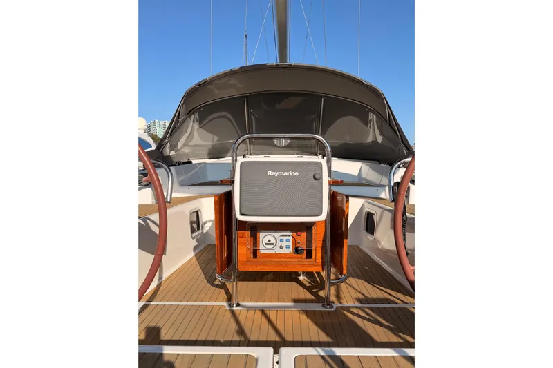 Motu Yacht Photos Pics Cockpit of 2013 Jeanneau 57 sailboat with Raymarine navigation system.