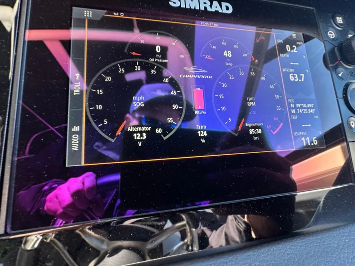  Yacht Photos Pics Simrad display on 2023 Chaparral 270 OSX showing engine metrics and navigation data.