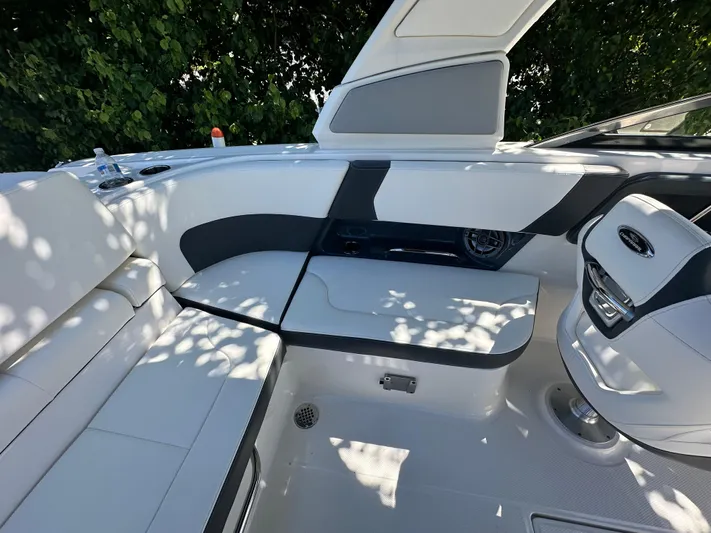  Yacht Photos Pics 2023 Chaparral 270 OSX boat interior with sleek seating and modern design.