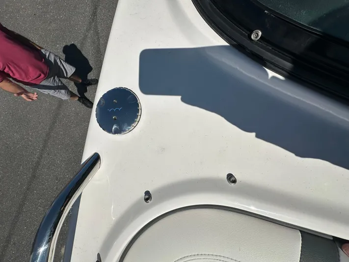  Yacht Photos Pics 2023 Chaparral 270 OSX boat deck with visible fittings and shadow.