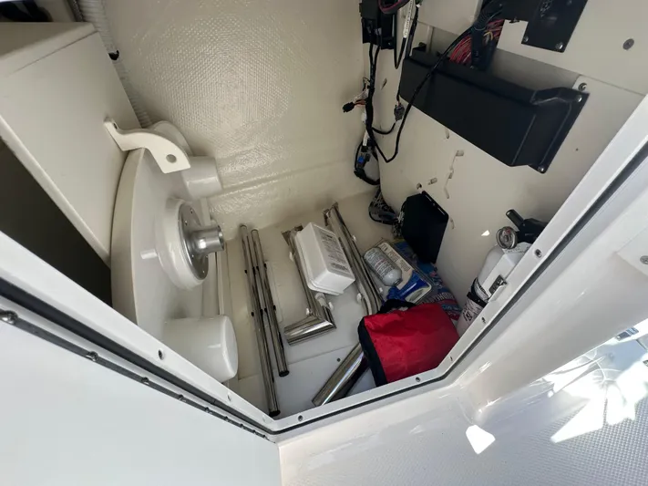  Yacht Photos Pics Storage compartment of 2023 Chaparral 270 OSX boat with equipment and accessories.