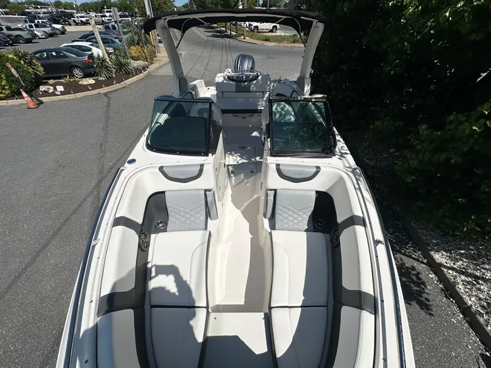  Yacht Photos Pics 2023 Chaparral 270 OSX boat with spacious seating and sleek design.