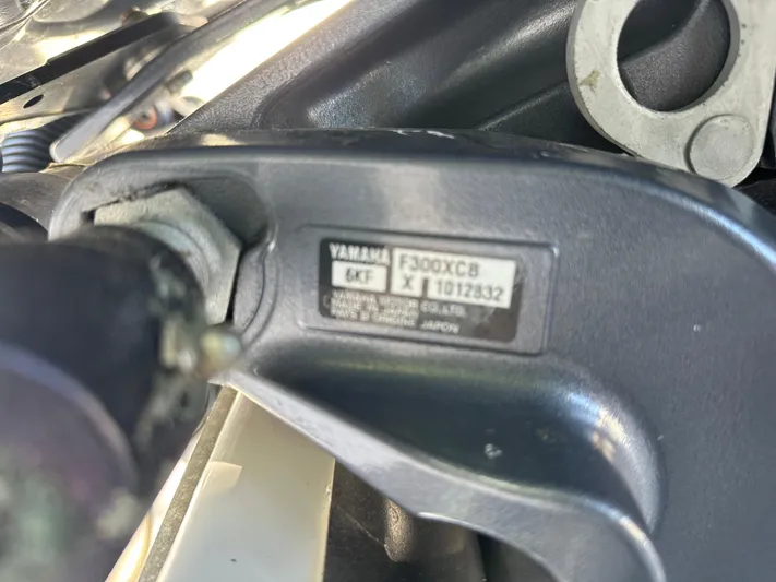  Yacht Photos Pics Close-up of Yamaha F300XCB engine part on 2023 Chaparral 270 OSX boat.