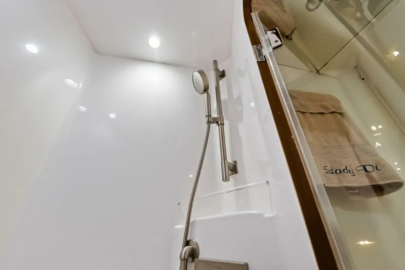 Lady Di Yacht Photos Pics Shower area in 2012 Viking 82 Convertible yacht with modern fixtures and embroidered towel.