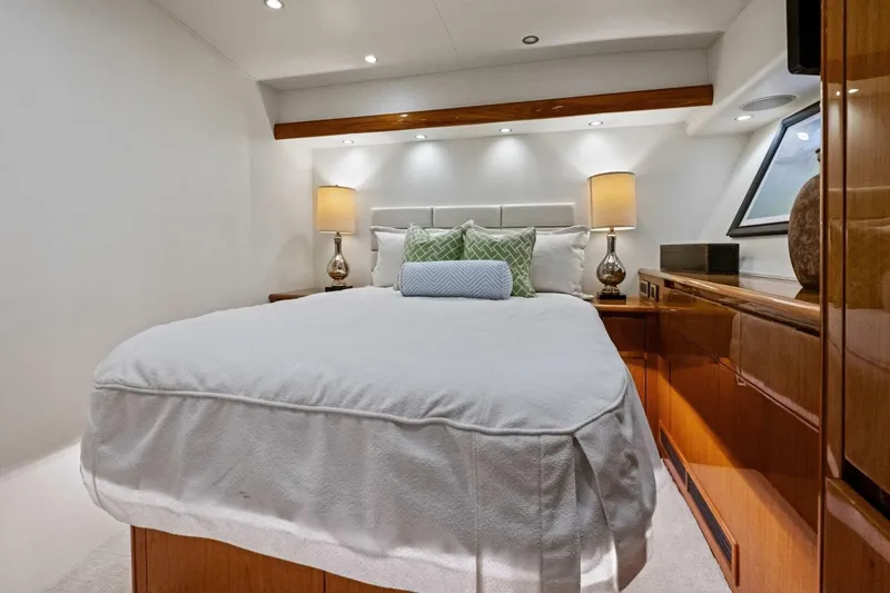 Lady Di Yacht Photos Pics Luxurious bedroom interior of 2012 Viking 82 Convertible yacht with elegant decor.