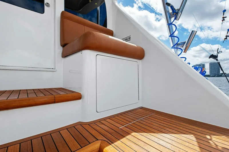 Lady Di Yacht Photos Pics 2012 Viking 82 Convertible yacht with teak deck and cushioned seating.