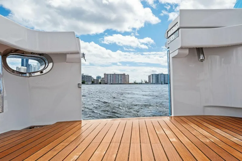 Lady Di Yacht Photos Pics Viking 82 Convertible 2012 yacht deck with cityscape and water view.