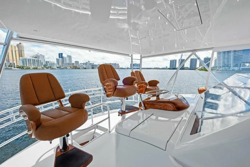Lady Di Yacht Photos Pics Luxurious 2012 Viking 82 Convertible yacht helm with city skyline view.