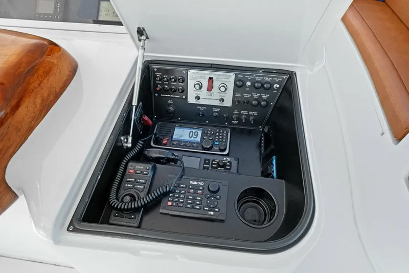Lady Di Yacht Photos Pics Control panel of 2012 Viking 82 Convertible yacht with communication devices and switches.