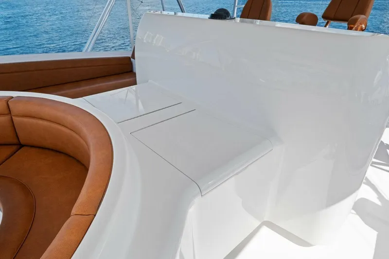 Lady Di Yacht Photos Pics Luxurious seating on 2012 Viking 82 Convertible yacht, featuring sleek design and ocean view.