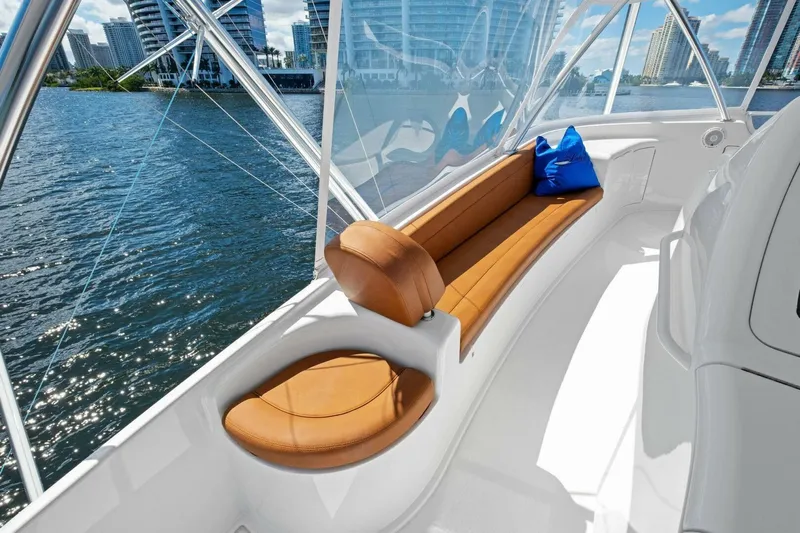 Lady Di Yacht Photos Pics Luxurious seating on 2012 Viking 82 Convertible yacht with waterfront city view.