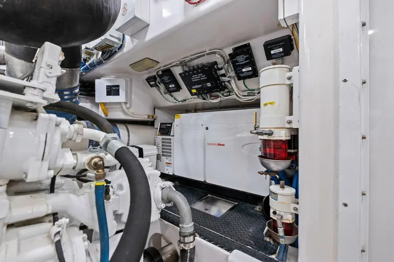 Lady Di Yacht Photos Pics Engine room of 2012 Viking 82 Convertible yacht with Cummins Onan generator.