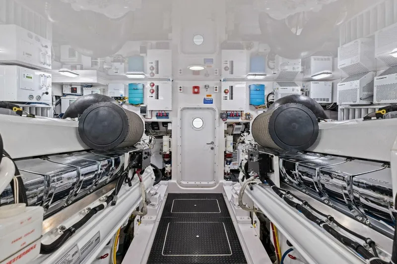 Lady Di Yacht Photos Pics Engine room of 2012 Viking 82 Convertible yacht, featuring advanced machinery and equipment.