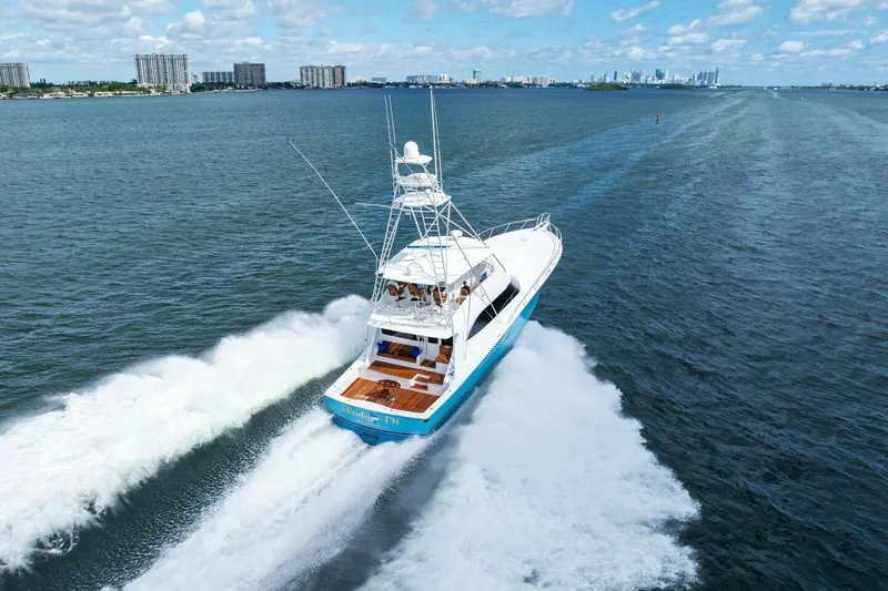 Lady Di Yacht Photos Pics Aerial view of 2012 Viking 82 Convertible yacht cruising on open water.