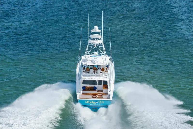 Lady Di Yacht Photos Pics Viking 82 Convertible yacht cruising on open water, rear view, 2012 model.