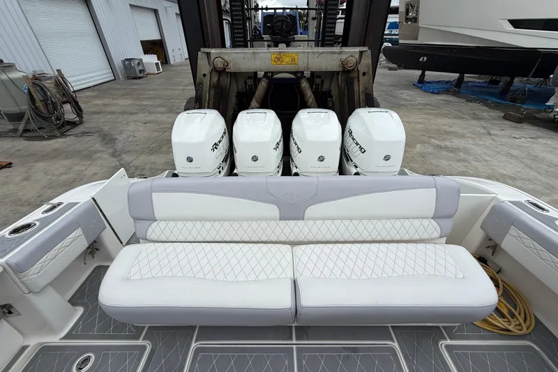  Yacht Photos Pics 2021 Fountain 43 NX boat with quad outboard engines and luxurious seating.