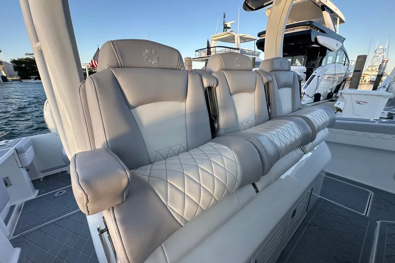  Yacht Photos Pics Luxurious seating on 2021 Fountain 43 NX boat, featuring elegant diamond-stitched upholstery.