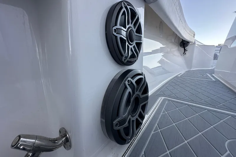  Yacht Photos Pics 2021 Fountain 43 NX boat with dual speakers and textured flooring.