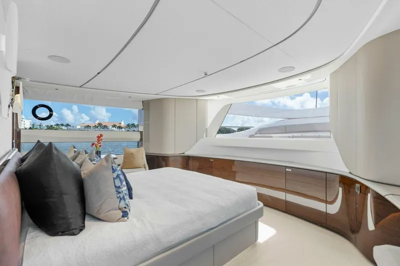 Lady Lion Yacht Photos Pics Luxurious bedroom interior of 2023 Princess X95 yacht with scenic ocean view.